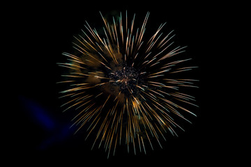 Center Yellow Sparkling Fireworks Background on Night Scene
