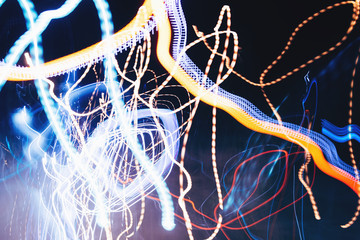 Network concept. Visual image of the nervous system. Long exposure colorful lines on a black background.