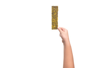 Kid hand holding Deep Fried Green Seaweed Thin Chips Crispy Snack isolated on white