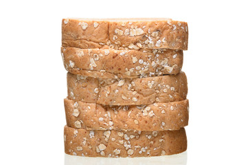 Fresh homemade  baked whole grain bread and sliced bread isolated on white