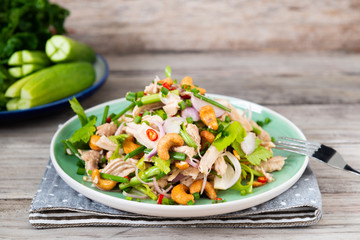 Steamed rip chicken spicy salad with shallot, celery, chili and Scallion.