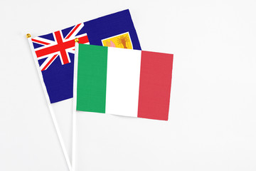 Italy and Turks And Caicos Islands stick flags on white background. High quality fabric, miniature national flag. Peaceful global concept.White floor for copy space.