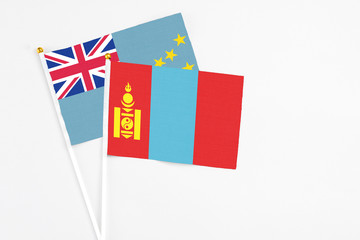 Mongolia and Tuvalu stick flags on white background. High quality fabric, miniature national flag. Peaceful global concept.White floor for copy space.