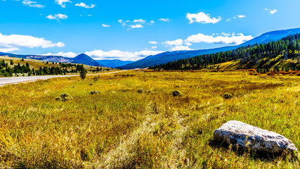 Fototapeta premium Highway 191 as it runs along the Gallatin River through the western most part of Yellowstone National Park in Montana, United States of America
