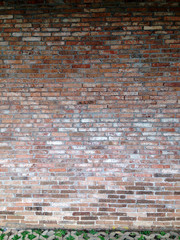 Naklejka premium Red bricks exposed wall material