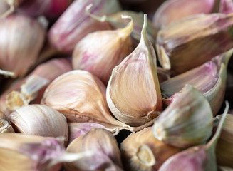 Cloves of garlic as a background