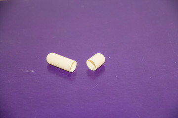 red pills on white background