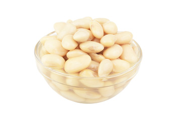 Fototapeta na wymiar Baked white beans in glass bowl isolated on white background