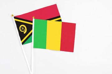 Mali and Vanuatu stick flags on white background. High quality fabric, miniature national flag....
