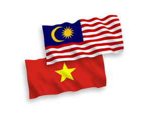 Flags of Vietnam and Malaysia on a white background