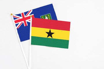 Ghana and British Virgin Islands stick flags on white background. High quality fabric, miniature national flag. Peaceful global concept.White floor for copy space.