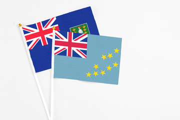 Tuvalu and British Virgin Islands stick flags on white background. High quality fabric, miniature...