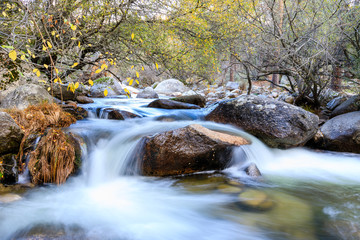 River in La Pedriza, in the mountains of Madrid, area characterized by large granite rocks