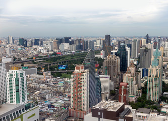 Fototapeta na wymiar Bangkok capital city of Thailand with high building from top view
