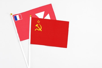 Soviet Union and Wallis And Futuna stick flags on white background. High quality fabric, miniature national flag. Peaceful global concept.White floor for copy space.