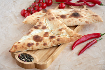 Traditional arabic pie Manakish with spinach and potato 