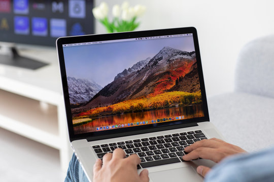 Backgrounds MacOS High Sierra in the screen of MacBook Pro