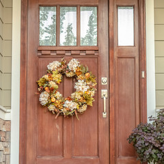 Square frame Front door with dried flower wreath day