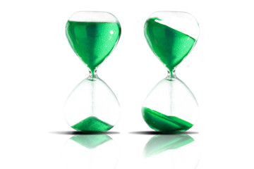 Collection of hourglasses on white background