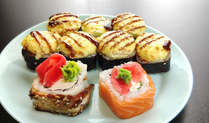 Variety of japanese sushi rolls. Sushi roll set on a plate.