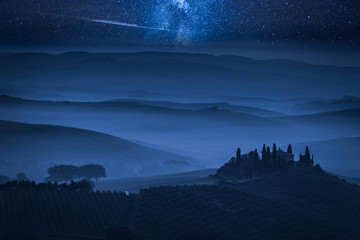 Naklejka na ściany i meble Milky way over the valley with farm at night