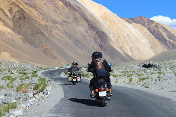 Motorcycle travelers ride in indian Himalaya roads,leh ladakh .