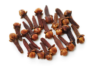 dry cloves on white background