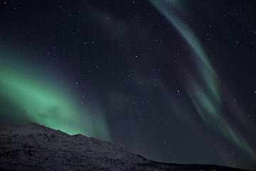 Northern lights or borealis aurora in north Norway