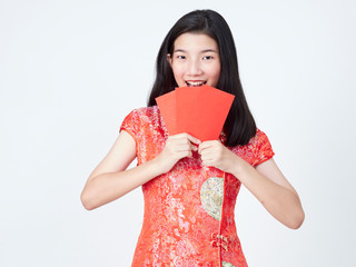 Woman in traditional chinese dress holding red envelope