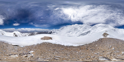Spherical panorama of the Pamir mountain. Slope of Lenin Peak to an altitude of 5900 meters. Spherical panorama 360 degrees 180 Mountain hiker to climb a mountain of snow couloir.