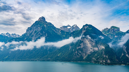 Switzerland, Panoramic view on green Swiss Alps and lake Lucerne near Isleten, Bauen