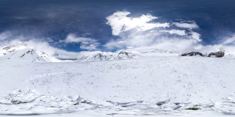 Spherical panorama of the Pamir mountain. Slope of Lenin Peak to an altitude of 3900 meters. Spherical panorama 360 degrees 180 Mountain hiker to climb a mountain of snow couloir.