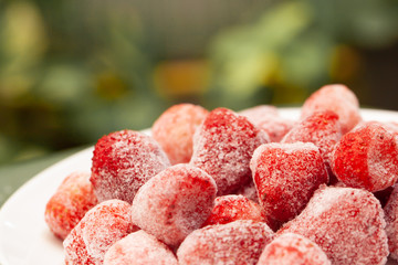 Close up of frozen fresh organic strawberry