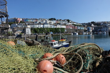 Beautiful Brixham harbour landscape in the middle of a hot bright summer
