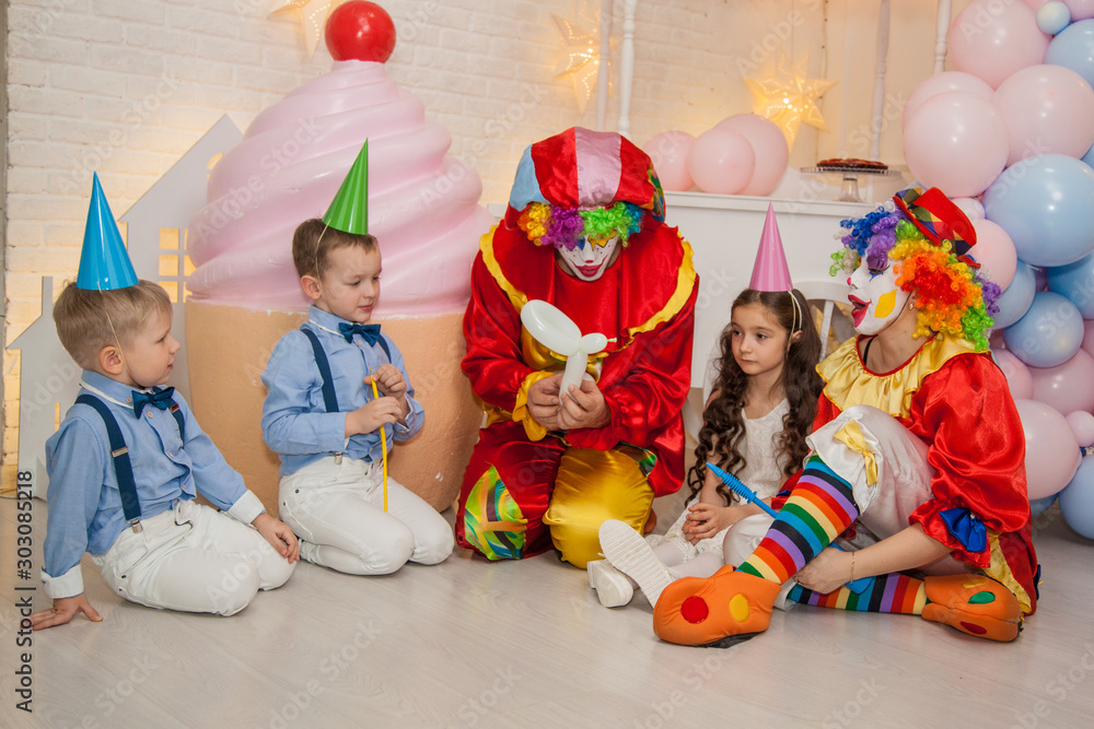 Wall mural Clowns from the circus on the birthday of a child. Party for children.