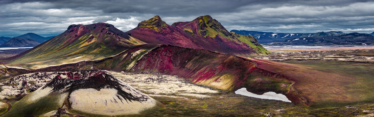 Panoramic view of colorful rhyolite volcanic mountains Landmannalaugar in Icelandic Highlands as...