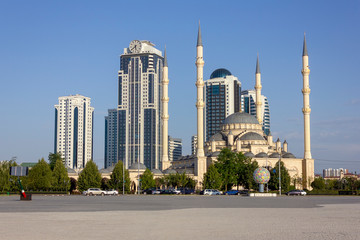 Grozny, Republic of Chechnya / Russian Federation - 08.08.2019: mosque "Heart of Chechnya" in Grozny against skyscrapers
