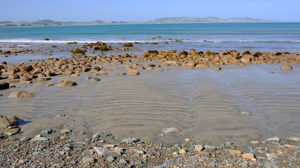 Fototapeta na wymiar Colac Bay beach and seashore, Riverton, Southland, New Zealand