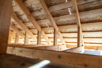 Wooden roof at a cottage construction site