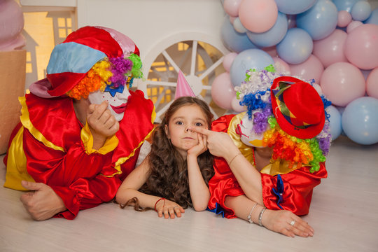 Clowns from the circus on the girls birthday. Party for children.