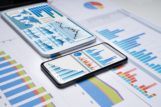 Mobilephones With Business Charts