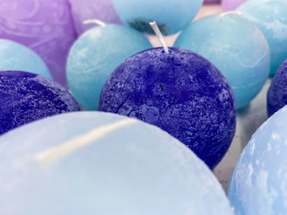 blue candles for sale in a supermarket