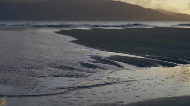 ocean tide waves came out to the beach