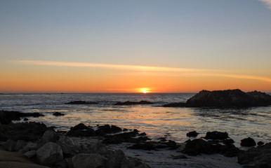 Fototapeta na wymiar Beautiful view of sunset from Pebble Beach in Monterey County, California. Pebble beach is part of 17-Mile Drive which is a scenic road through Pacific Grove.
