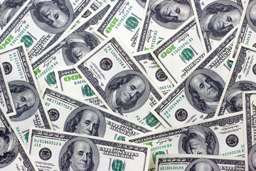 American hundred dollar bills as a money background. Business concept.