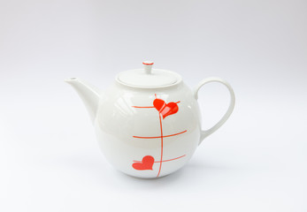 Porcelain coffee or tea pitcher, kettle, can, jug - with heart pattern - retro modcentury mass product china ware isolated