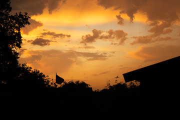 sunset silhouette of a flag © Max