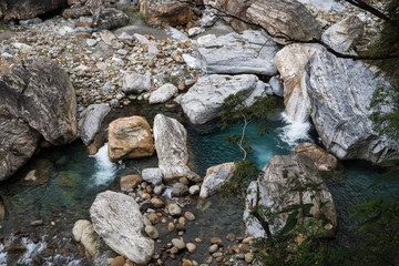 Scenic picture of river waterfall running through rocks at Taroko National Park in Taiwan