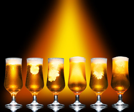  Set Glass of cold craft light beer on dark background...