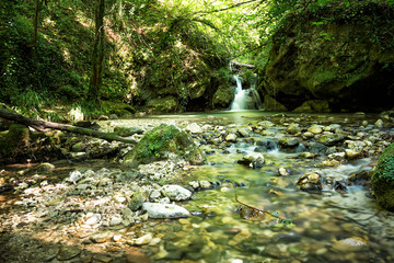Valley of the Alento river in Serramonacesca (Italy): small lake and waterfall in a wild environment